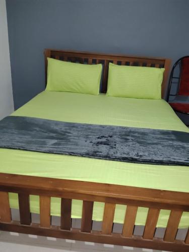 Кровать или кровати в номере Sunny's Holiday Homes