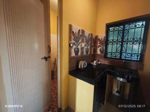 Køkken eller tekøkken på Carvalhos Regina guest house