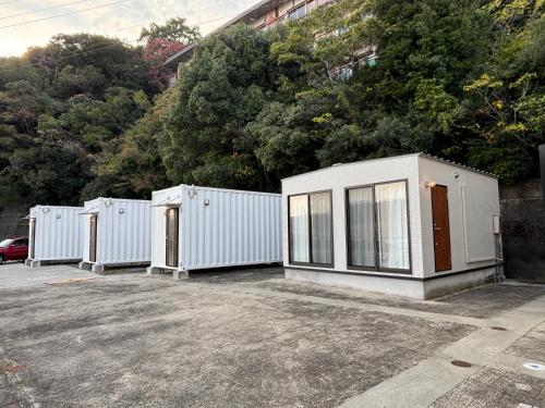 a row of portable toilets in a parking lot at Yura terrace in Yura