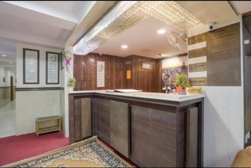 Η κουζίνα ή μικρή κουζίνα στο Wall Street Hotel