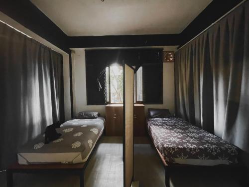 Postel nebo postele na pokoji v ubytování KNM Living Home