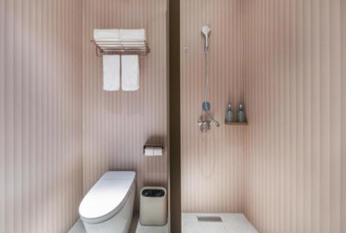 Et badeværelse på Hanting Hotel Shanghai Gongkang Road Subway Station