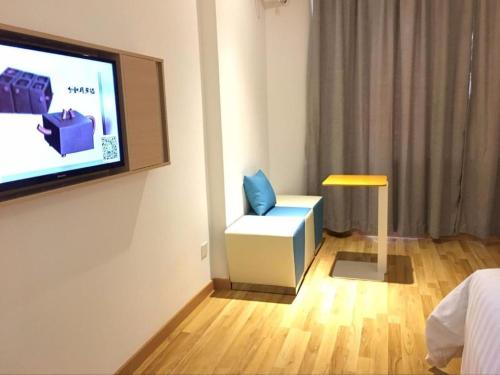 Μια τηλεόραση ή/και κέντρο ψυχαγωγίας στο 7 Days Inn Huizhou Danshui Yi Center