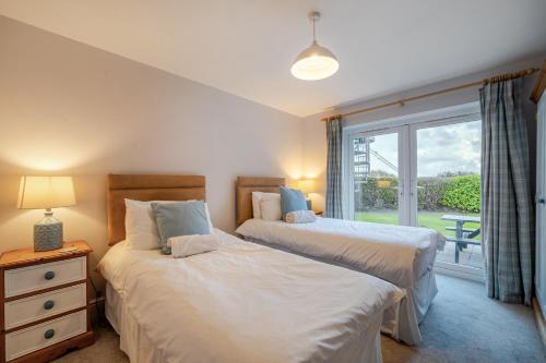 Postel nebo postele na pokoji v ubytování Curragho