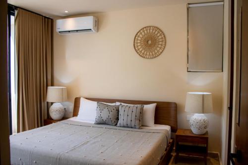 Una cama o camas en una habitación de Peregrina Tulum 202B 1BR Condo