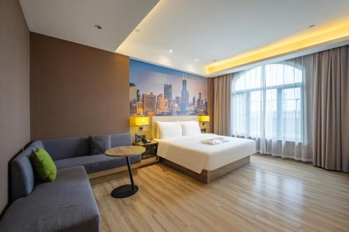 Postel nebo postele na pokoji v ubytování Atour Hotel Shanghai Xinzhuang
