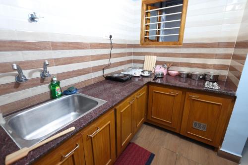 Nhà bếp/bếp nhỏ tại Bluetique Beach House