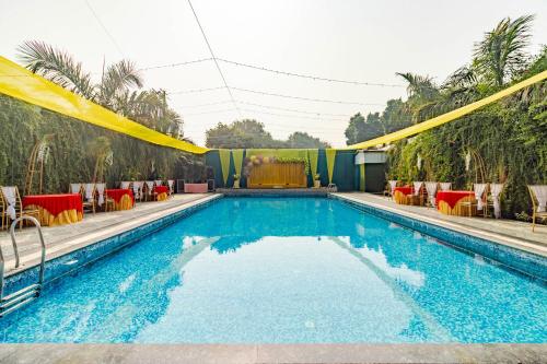 Πισίνα στο ή κοντά στο Treebo KGF Villa