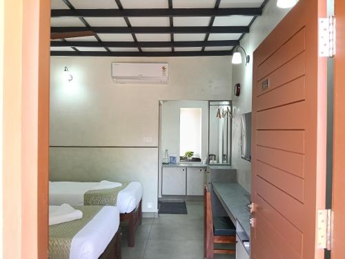 Foto de la galería de GREEN PLANET HOTEL en Mattanūr