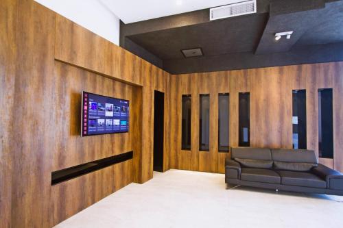 Postel nebo postele na pokoji v ubytování Hotel Lux