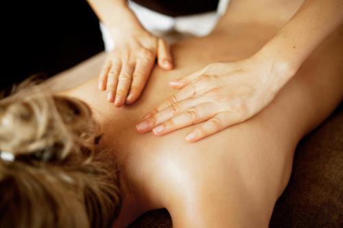 a woman laying on her back with her hands at Romantik Hotel Waldschlösschen in Schleswig