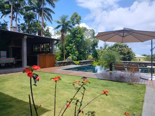 Фотография из галереи L'enclos Pandora à SAINTE ROSE в городе Сент-Роз