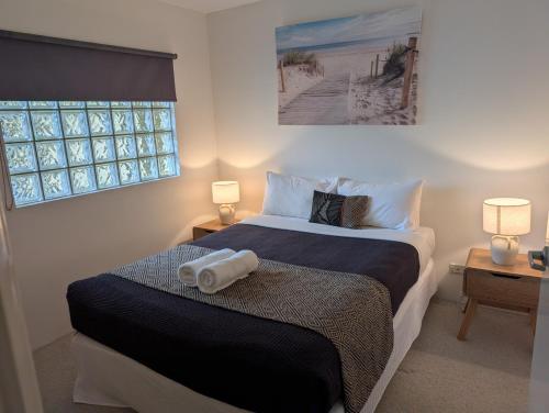 Ένα ή περισσότερα κρεβάτια σε δωμάτιο στο Inn Cairns