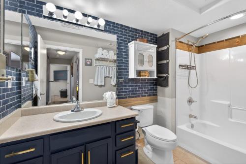 a bathroom with a sink and a toilet at New Castles Kings N Queens 14mins to Glenwood Springs in New Castle