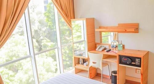 Η κουζίνα ή μικρή κουζίνα στο An Hotel Jakarta