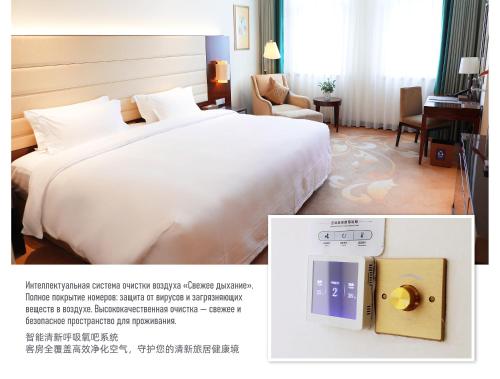 Postel nebo postele na pokoji v ubytování Ritan Hotel Downtown Beijing