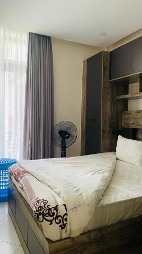 Llit o llits en una habitació de Agasaro Luxe