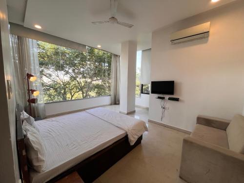 Postel nebo postele na pokoji v ubytování Hotel Golden Leaf