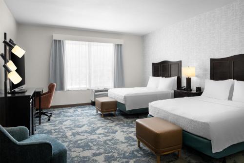 Ένα ή περισσότερα κρεβάτια σε δωμάτιο στο Hampton Inn and Suites Hope