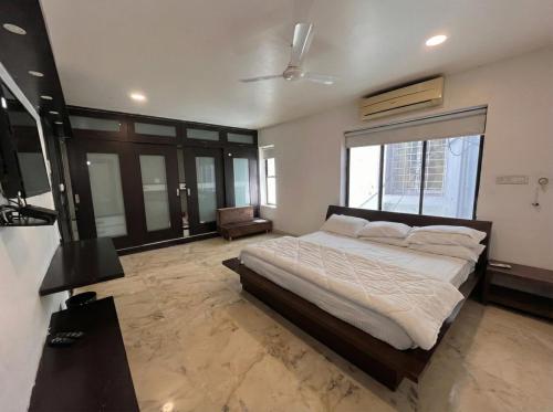 Ένα ή περισσότερα κρεβάτια σε δωμάτιο στο Urban Nest