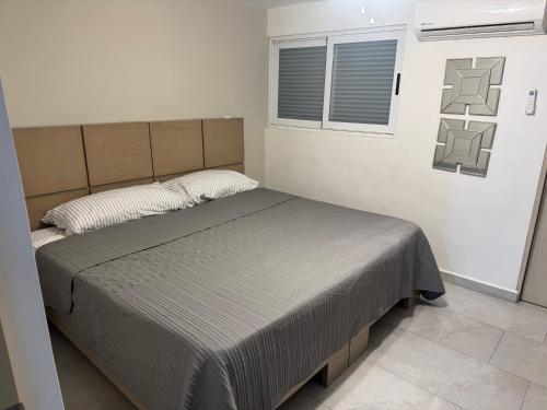 Кровать или кровати в номере Departamento Ejecutivo de Lujo