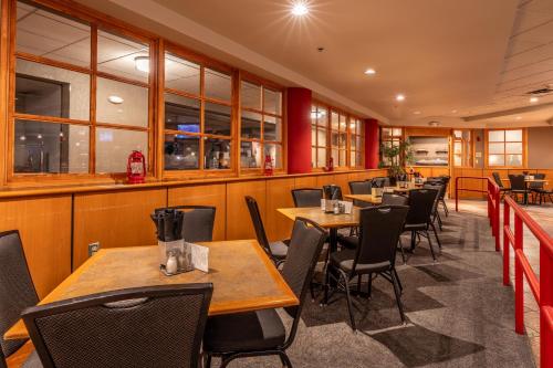 a row of tables and chairs in a restaurant at Westmark Fairbanks Hotel and Conference Center in Fairbanks