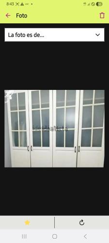 a page of a cabinet with four windows at villa Amparo in Villaviciosa de Odón