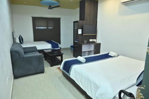 Voodi või voodid majutusasutuse Via Banarasi Kothi - Sankat Mochan Temple toas