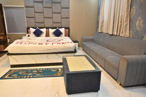 Voodi või voodid majutusasutuse Via Banarasi Kothi - Sankat Mochan Temple toas