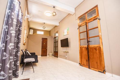 Μια τηλεόραση ή/και κέντρο ψυχαγωγίας στο SAPHIR RESIDENCE - Petit Havre de paix en Centre Ville