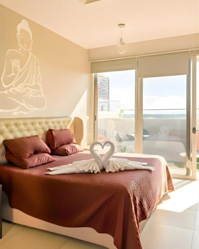 Ένα ή περισσότερα κρεβάτια σε δωμάτιο στο Casa Buddha - Pool, Jacuzzi and private terrace