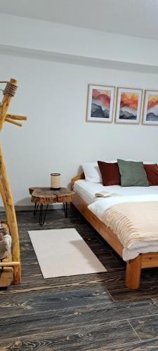 Postel nebo postele na pokoji v ubytování Apartman Maximus