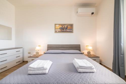 Postel nebo postele na pokoji v ubytování Casa Bellavista