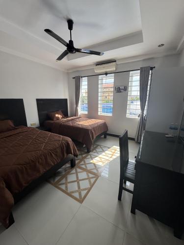 En eller flere senge i et værelse på Villa de Sancho