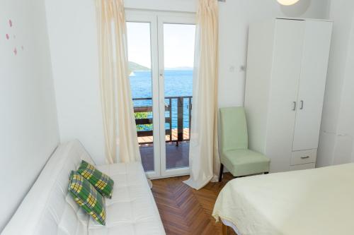 Ένα ή περισσότερα κρεβάτια σε δωμάτιο στο Apartment Ivo