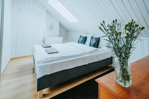 Postel nebo postele na pokoji v ubytování Willa przy Krupówkach