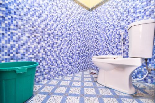 Ένα μπάνιο στο Berkah Guest House Prambanan By ARBA