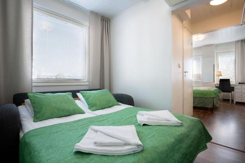 Postel nebo postele na pokoji v ubytování Hotel Milton