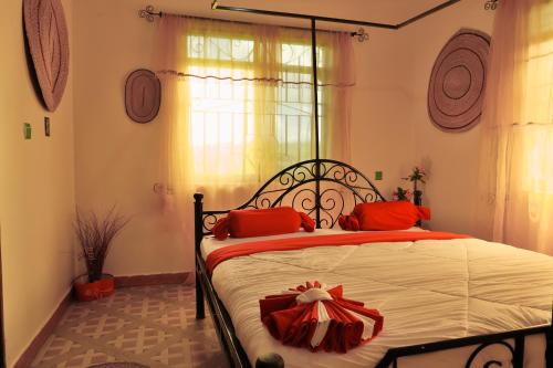 Postel nebo postele na pokoji v ubytování Msovi Hideaway