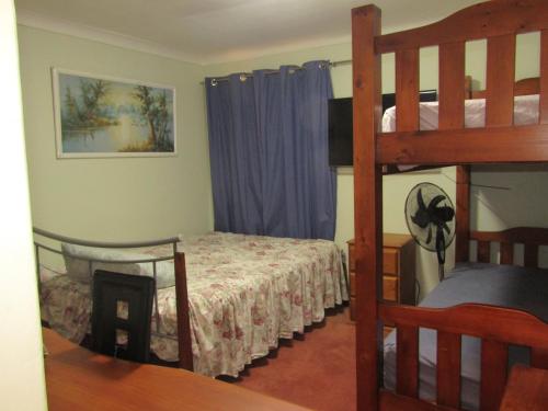 Postel nebo postele na pokoji v ubytování Santa lodge