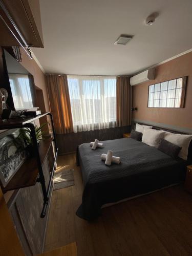 Кровать или кровати в номере City Hotel