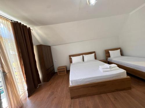 Postel nebo postele na pokoji v ubytování Lagusheda