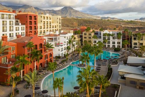 an aerial view of a resort with a swimming pool at Bahia Principe Escape Tenerife - Hyatt Inclusive Collection in Adeje