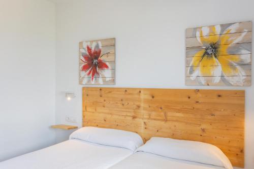 En eller flere senge i et værelse på V60A Villa Lucia