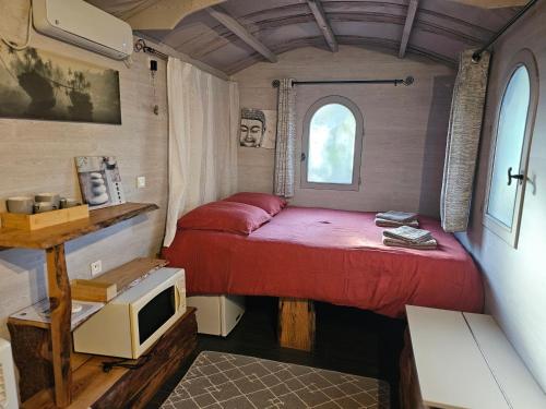 Postel nebo postele na pokoji v ubytování Les Chouchous du Garthieu