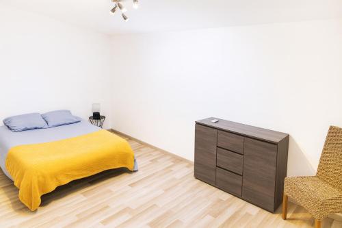 Postel nebo postele na pokoji v ubytování Séjourner chez Roto