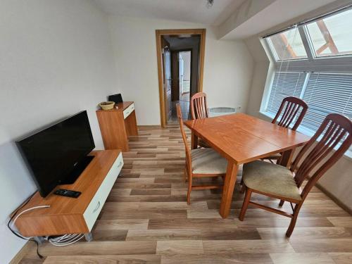 TV a/nebo společenská místnost v ubytování Rooftop apartment with stunning view