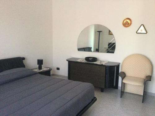 En eller flere senge i et værelse på Elegante Appartamento Palermo