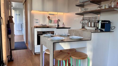 Η κουζίνα ή μικρή κουζίνα στο Ty Fret - vue mer