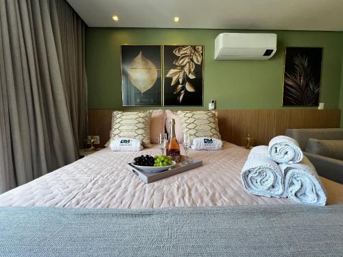 Ένα ή περισσότερα κρεβάτια σε δωμάτιο στο Setai Aquamaris Premium 3pessoas Vista Mar Lateral